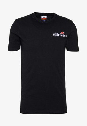 Juodą trumpų rankovių marškinėlį, pagamintą iš medvilnės. Yra apvalus iškirpimas ir siuvinėtas "ellesse" logotipas su raudonu ir oranžiniu akcentu.