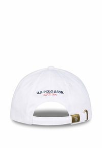 White baseball cap featuring embroidered "U.S. POLO ASSN." and "SINCE 1890" in navy and red. Adjustable strap with gold-toned hardware.
