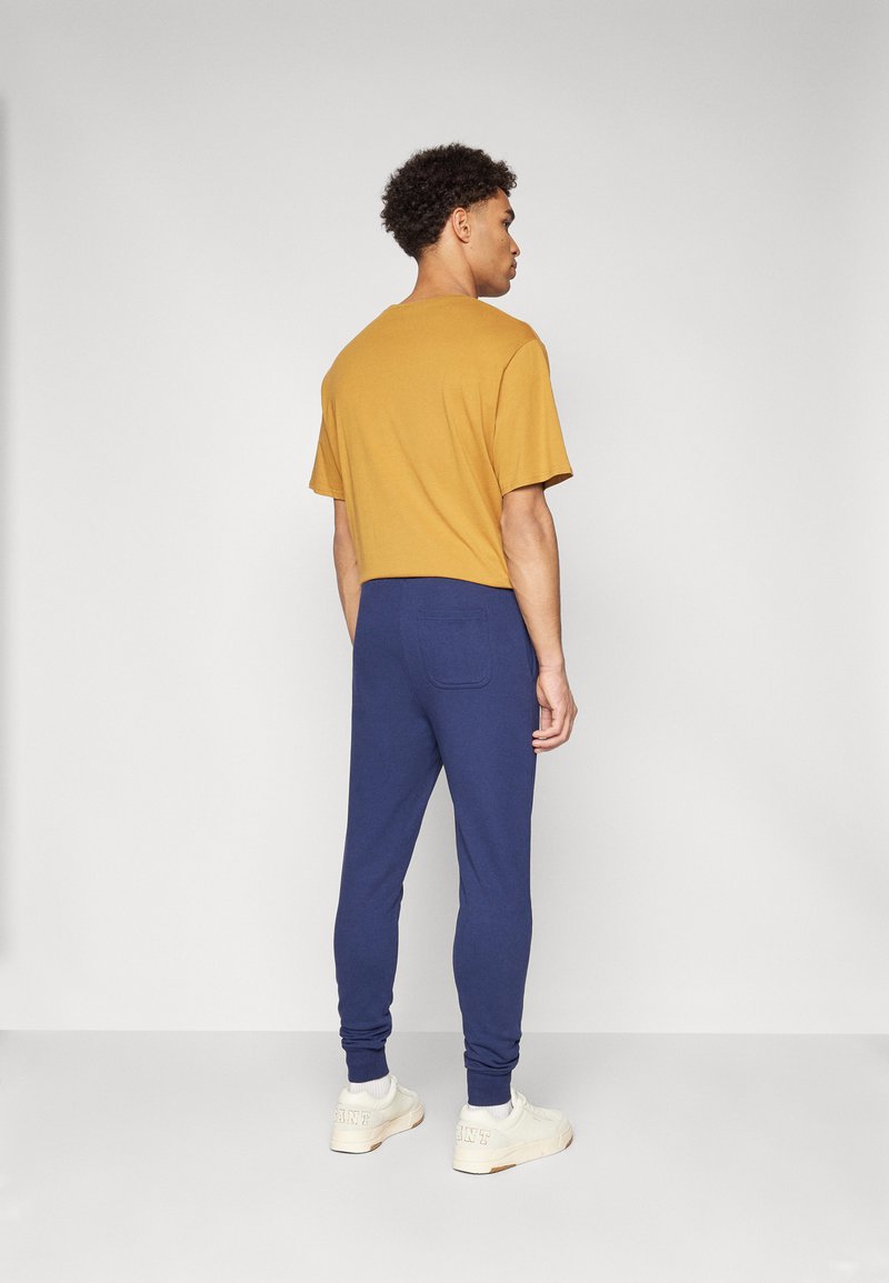 Lyle Scott SKINNY Tracksuit bottoms navy/dark blue Zalando