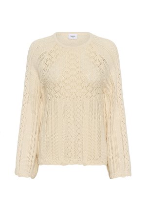 Krémově zbarvený pletený svetr s dlouhými rukávy a složitými krajkovými vzory na těle a rukávech.