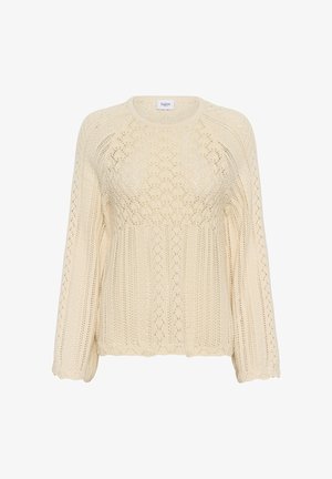 Krémově zbarvený pletený svetr s dlouhými rukávy a složitými krajkovými vzory na těle a rukávech.