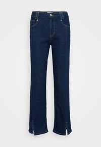 Jeans de ganga azul escuro com um design de perna reta, apresentando detalhes de costura subtis e fendas laterais na barra para um acabamento único.