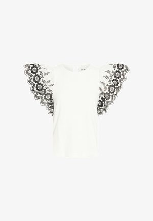 Balta marškinėliai su juodomis siuvinėtomis nėrinių rankovėmis, puoštais gėlių motyvais ir banguotais kraštais; apykaklė yra apvali, o nugaros dalyje yra aklė.