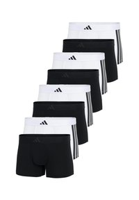 Herren-Boxershorts-Set mit vier schwarzen und vier weißen Paaren. Hergestellt aus dehnbarem Stoff, mit kontrastierenden Bündchen und ikonischer Markenkennzeichnung.