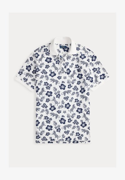Weißes Poloshirt mit einem marineblauen Blumen- und Leopardenmuster. Klassischer Kragen und kurze Ärmel. Weicher, atmungsaktiver Stoff.