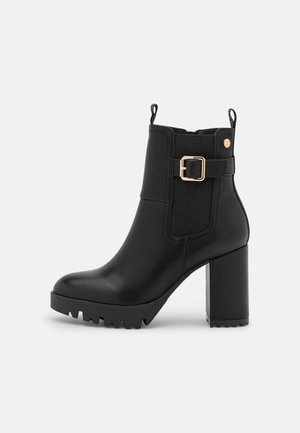 Bottines à talons hauts - black