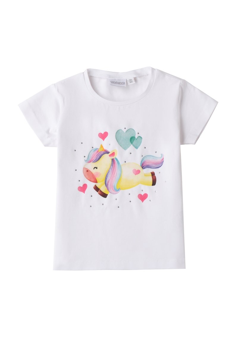 Camiseta de algodón blanca con una ilustración colorida de un unicornio, rodeada de corazones y pequeños rhinestones decorativos. Mangas cortas.