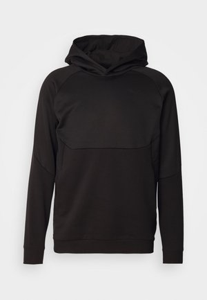 Zwart hoodie met lange mouwen, raglanontwerp en een zachte textuur. Voorzien van een kangoeroezak en minimalistische branding.