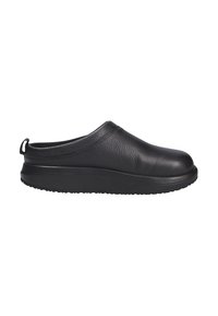 Scarpa nera in pelle slip-on con punta arrotondata, tomaia testurizzata e una robusta suola in gomma nera. Presenta un piccolo tab di trazione sul tallone.