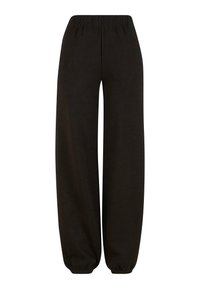 Pantalons de jogging larges noirs en tissu doux, dotés d'une ceinture élastique et de poignets élastiques aux chevilles pour un ajustement confortable.