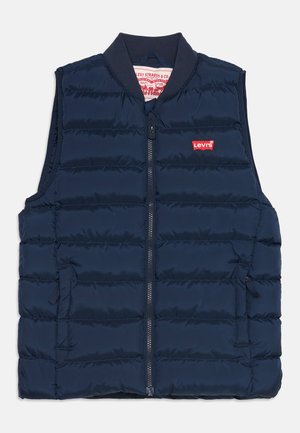 Navyblå polstret ærmeløs vest med lynlås foran, to lommer, ribstrikket krave og lille rødt Levi's-logo på brystet.