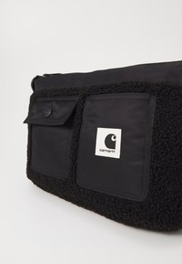Carhartt WIP ORLA STRAP BAG UNISEX - Axelremsväska - black