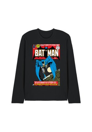 Black long-sleeve shirt featuring a vintage Batman comic cover with Batman leaping, city skyline, and bold red and yellow text.