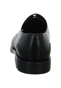 Schwarze Lederschuhe mit glatter Oberfläche. Brogue-Verzierungen an den Seiten. Abgerundeter Absatz und eine strukturierte Sohle. Geschlossene Ferse.