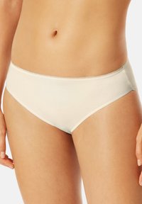 Hellbeige Hipster-Unterwäsche aus glattem Stoff, mit einem weichen elastischen Bund und minimaler Naht für einen nahtlosen Look.