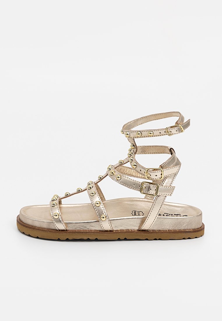 Cassis côte d’azur Sandalen goudkleurig