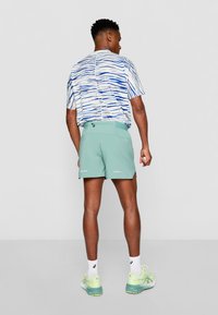 ASICS ROAD 5IN SHORT - Kurze Sporthose - celadon