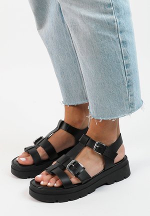 Sandalen met plateauzool - black