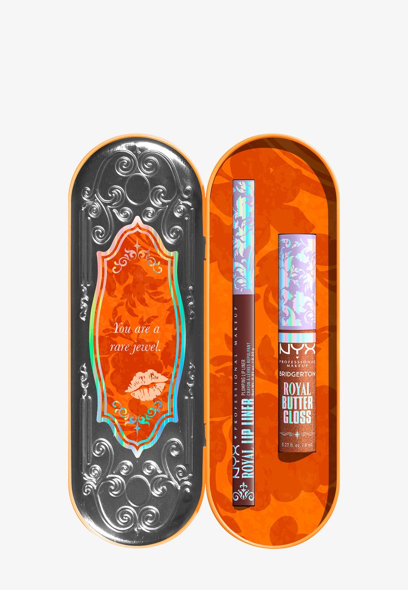 Metallic silver tin container with intricate designs, orange interior, includes a lip liner and gloss with decorative packaging details.