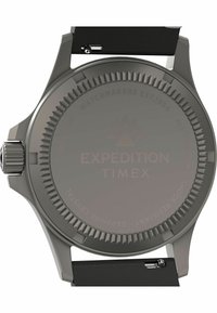 Montre en titane avec bracelet en silicone noir, présente un biseau texturé, un marquage gravé et un cristal saphir. Résistante à l'eau jusqu'à 200 m.