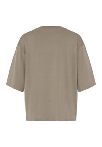 Beżowa, oversizeowa koszulka z krótkim rękawem, widoczna od tyłu, z okrągłym dekoltem i luźnym krojem.