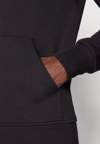Björn Borg ESSENTIAL HOODIE - Jersey con capucha - black beauty