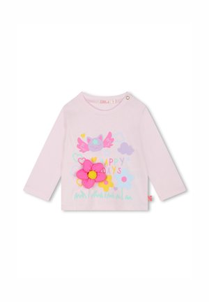 T-shirt en coton à manches longues de couleur rose clair, présentant un design floral avec une grande fleur rose et un graphisme de chat ludique, rehaussé d'accents colorés.