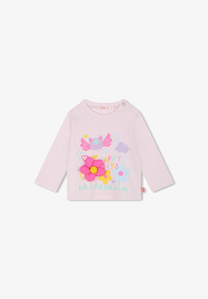 T-shirt en coton à manches longues de couleur rose clair, présentant un design floral avec une grande fleur rose et un graphisme de chat ludique, rehaussé d'accents colorés.