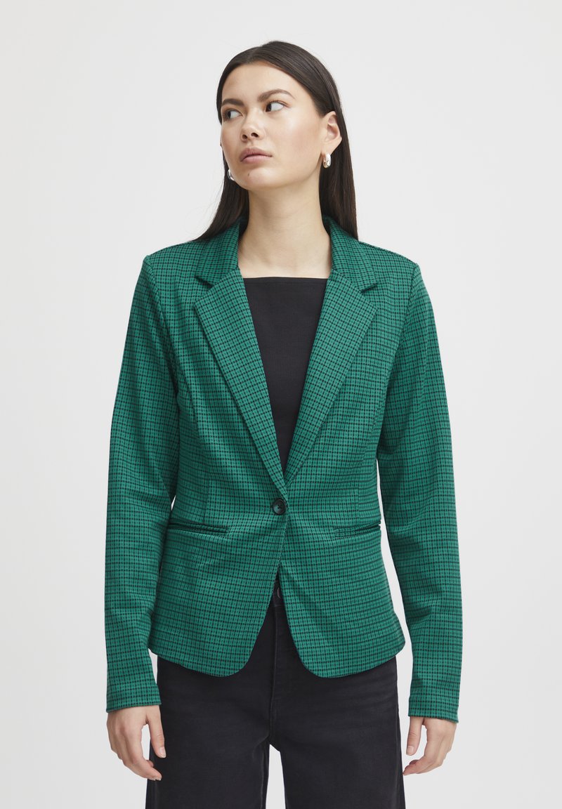 Blazer de cuadros verdes hecho de tela ligera, con cierre de un solo botón, solapas con muesca y dos bolsillos frontales.