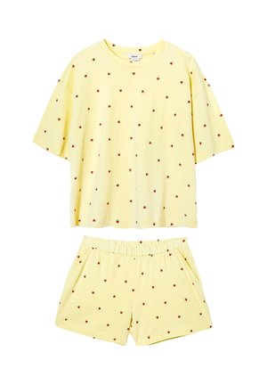 Soft yellow short-sleeve top and elastic waist shorts set with small red and green watermelon slice patterns.