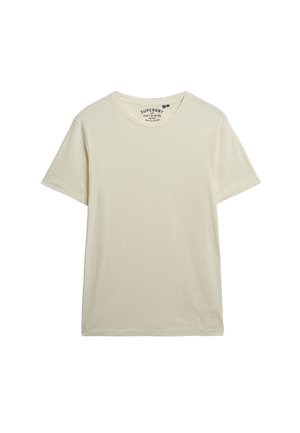 Cremefarvet bomulds T-shirt med korte ærmer, rund hals og en syet halsudskæring. Har et mærke indeni kraven.