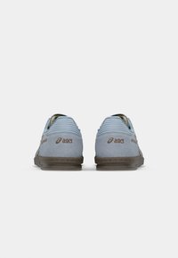 ASICS SportStyle SKYHAND OG UNISEX - Sneakers low - dolphin grey/pepper