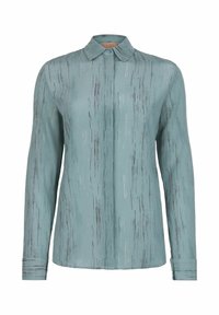 Ljusblå blus med ett subtilt vertikalt randmönster, långa ärmar och krage. Tillverkad i ett smidigt, lätt tyg.