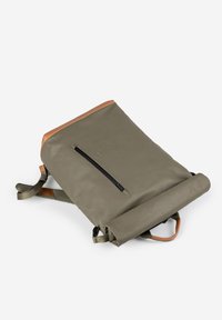 Olive-green roll-top backpack with a brown leather accent, featuring a front zip pocket and adjustable straps. Smooth texture and minimalist design.