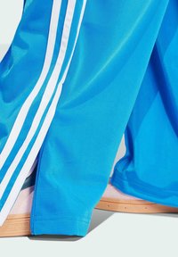 adidas Originals FIREBIRD LOOSE TRACK - Trainingsbroek - blue bird