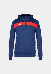 Sweatshirt à capuche bleu marine avec une bande horizontale rouge arborant un logo blanc. Manches longues, col avec cordon de serrage et accents latéraux contrastés.