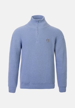 Pullover blu in maglia con colletto alto, mezza cerniera e un piccolo emblema sul lato sinistro del petto. Texture morbida e design a coste su tutta la superficie.
