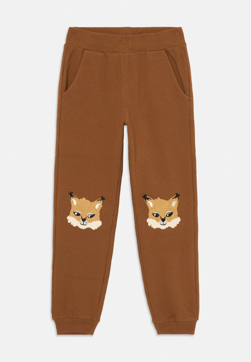 Braune Rippenhose mit zwei Taschen, die auf jedem Oberschenkel gestickte Fuchsgesichter zeigt. Sanfte Textur und elastischer Bund für angenehmen Tragekomfort.