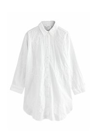 Chemise blanche à boutons, fabriquée en tissu texturé, avec une broderie florale sur le devant et des manches longues avec des poignets à button.