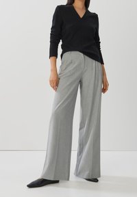 someday. Stickad tröja - black