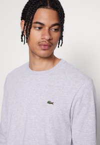 Lacoste Sport LONG SLEEVES SPORTS T-SHIRT COTTON - Ilgarankovis viršutinės dalies drabužis - silver chine