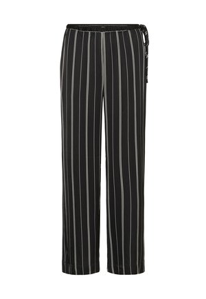 Pantalons larges à rayures noires et blanches avec une taille élastique et un détail de lien à l'avant, fabriqués dans un tissu léger.