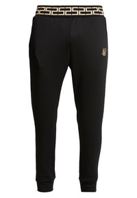 Svarta sweatpants med ett guldmönstrat midjeband, sidofickor och en diskret logotypdetalj på benet. Mjuk, slät textur.