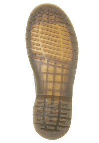Gummisohle mit geriffelter Textur, in Beige, ölbeständig und mit rechteckigem Muster für Traktion und Langlebigkeit.