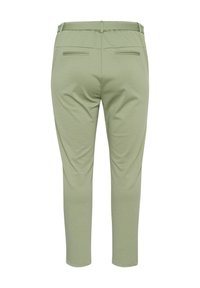Pantalon vert clair avec une texture lisse, doté d'une taille cintrée, de poches arrière et de jambes fuselées.