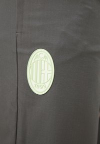 Puma AC MILAN  STATEMENT TRACK PANTS - Fanartikel - strong gray/fresh mint
