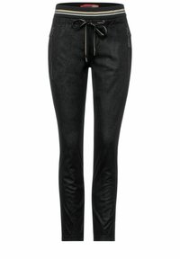 Svarta slim-fit joggingbyxor med mjuk textur, avsmalnande ben, kontrasterande randig elastisk midja och justerbar dragsko. Har sidofickor.