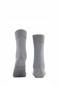 Calzini di cotone grigi con una texture liscia, caratterizzati da un bordo a coste e un tallone rinforzato. Design semplice senza ulteriori motivi o dettagli.