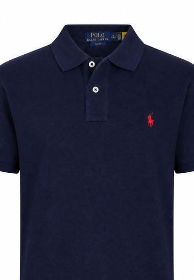 Camicia slim-fit Polo Ralph Lauren blu navy con colletto, due bottoni bianchi e logo ricamato rosso con giocatore di polo sul petto.