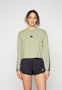 adidas Sportswear FUTURE ICONS THREE STRIPES LONG SLEEVE - Hosszú ujjú felső - tent green